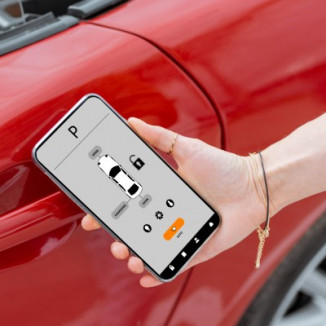 Women opening red car with mobile app